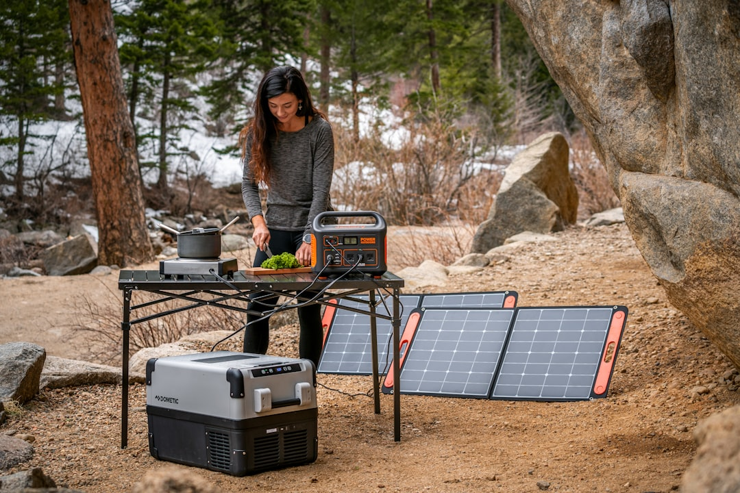 Portable power station in use at a campsite